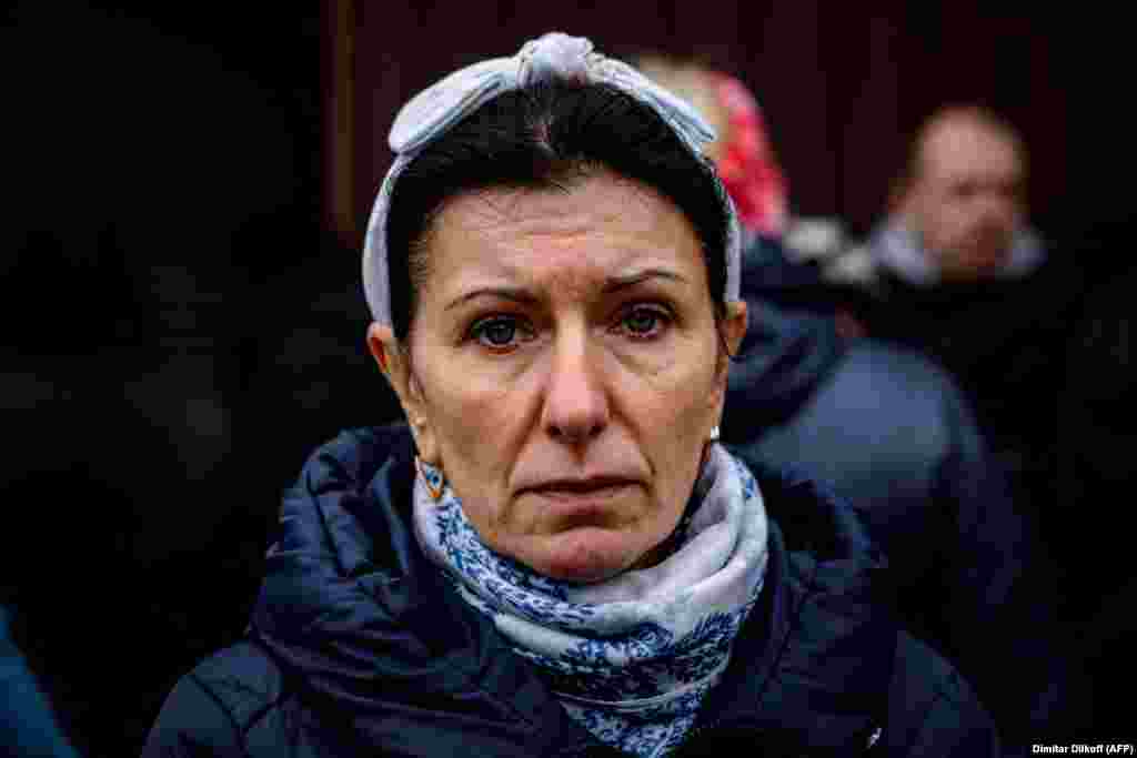 Inna Kupriyanov, a factory worker, waits to submit her DNA for the identification of her father in Izyum. Ukraine has sent several groups of investigators to the Kharkiv region. Prosecutor-General Andriy Kostin announced the teams would be "inspecting destroyed infrastructure, and with facts of murders of local residents."