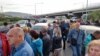 Energy sector workers block a road as part of protests that were held in Bulgaria on September 29. 