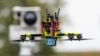 A so-called hunter drone in front of a mobile sensor unit for drone detection in Cochstedt, eastern Germany, on October 8, 2025.