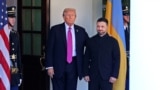 US President Donald Trump welcomes Ukrainian President Volodymyr Zelensky as he arrives for a meeting at the White House in Washington, DC, on October 17, 2025.